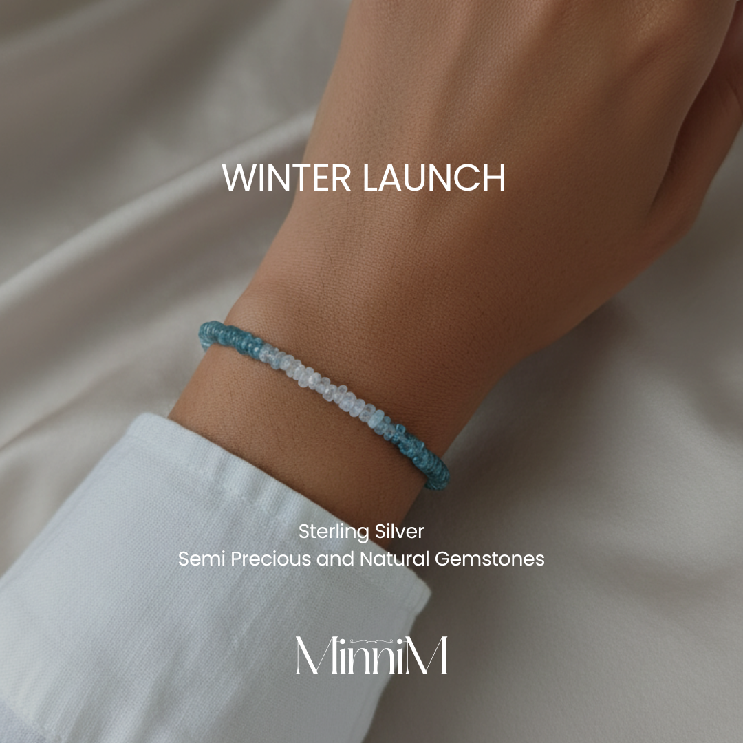 Bracelet with gemstones on a wrist, labeled 'Winter Launch' and featuring the brand 'MinniM'.