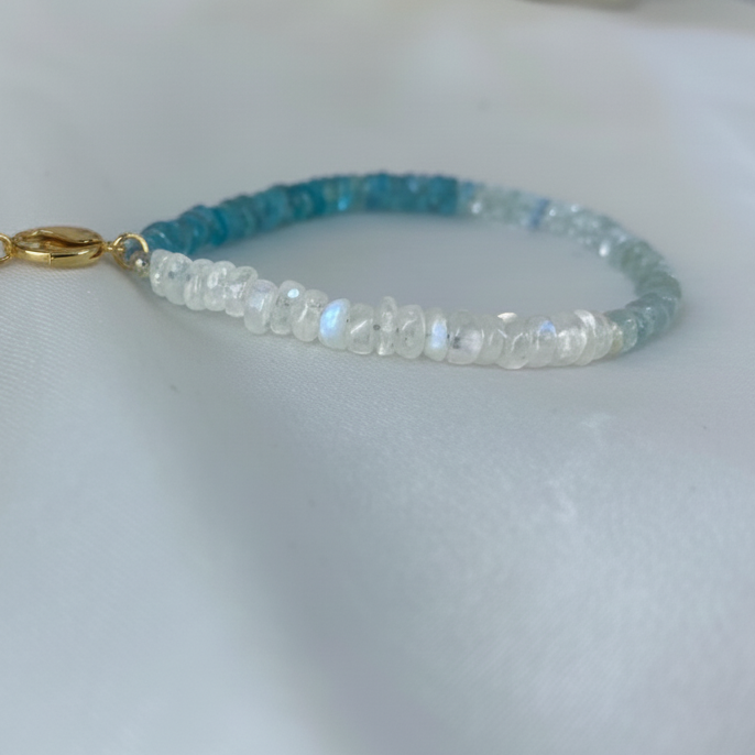 Gemstone bracelet with blue and clear beads